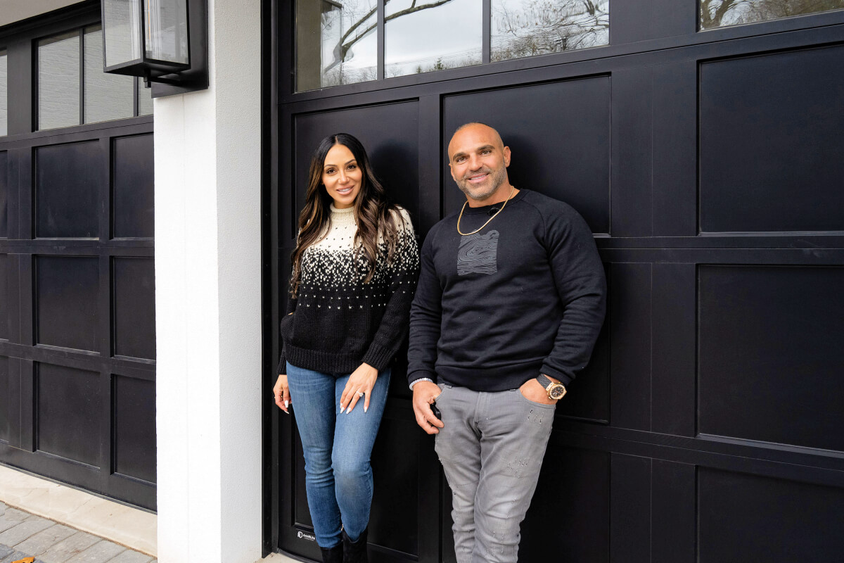These Modern Black Architectural Garage Doors were Custom Designed to Match the Gorga's Home's Color and Style