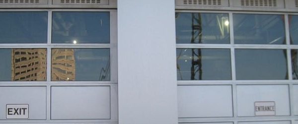 DIY Overhead Sectional Garage Door Installation: Costs to Consider in Advance